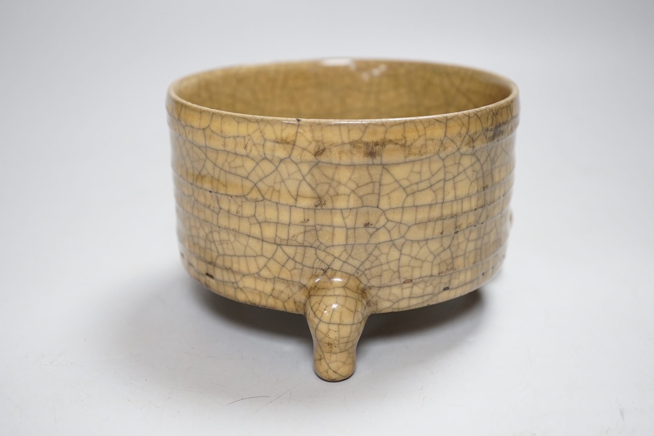 A Chinese Guan type tripod censer, ding, late Qing dynasty, 8cm high